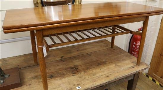 A teak coffee/dining table, W.130cm